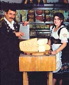 Prima Kase's 180-pound wheel Swiss - that's a lot of Reubens! Inset: Randy and Shelly Krahenbuhl
